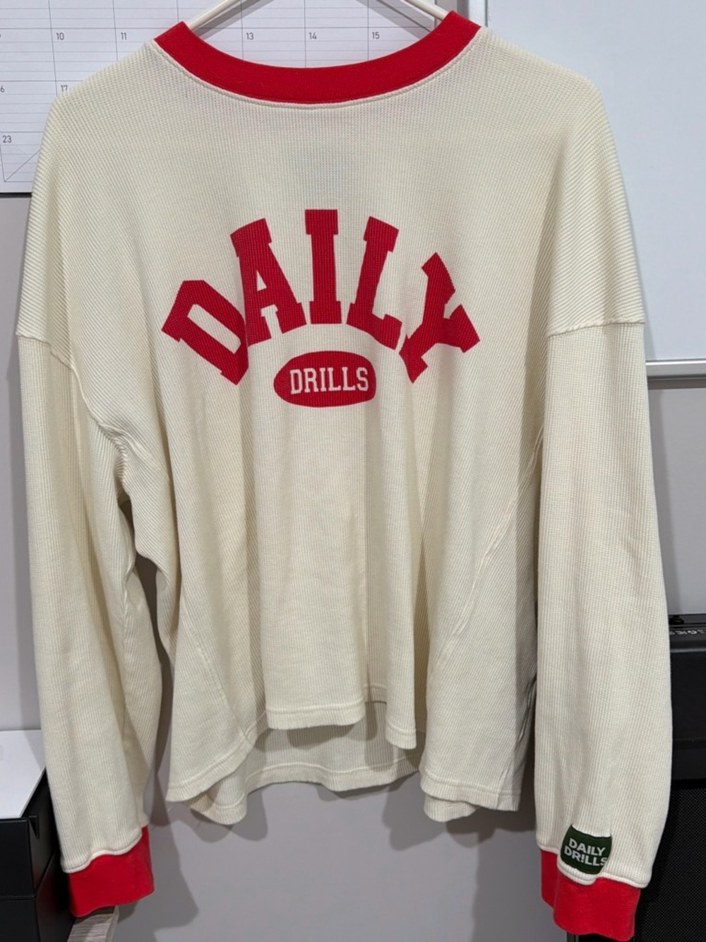 Daily Drills Cream Crewneck Sweatshirt with Red Lettering